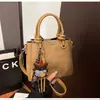Bolso Pequeño Cuadrado Casual de Nicho Estilo Coreano para Mujer 2025 Invierno Nuevo Versátil Elegante Lujo Ligero Bolso Cruzado Diario