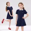 Novo Vestido Casual de Verão para Meninas, Estiloso e Moderno, para Crianças de Média e Mais Velhas, Estilo Escolar, Gola Lapela, Manga Curta, Vestido de Princesa