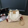 Bolsa tipo saco altamente estilosa, nova tendência outono 2026, bolsa transversal de cor sólida da moda, bolsa de mão personalizada com corrente de nicho