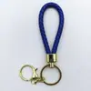 Venta al por mayor del fabricante Llavero de Cuerda de Aleación Tejida y Cuero Accesorios Colgantes Material PU Bolsas Pequeñas de Regalo Accesorios para Llaveros