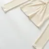 Top de punto sexy con patchwork de encaje hueco retorcido de manga larga para mujer, camiseta básica de otoño ajustada