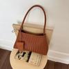 Bolsa de Ombro Feminina com Padrão Trançado Estilo Francês de Nicho para Verão 2025 Elegante Versátil de Alta Qualidade para o Dia a Dia