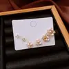 Brincos de Flor de Pérola com Agulha de Prata Galvanizada a Ouro Real 18K Luxo Acessível Moda Brincos Versáteis Brincos Personalizados de Nicho Atacado