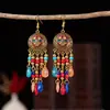 Gran oferta de pendientes de plumas vintage de estilo étnico, largos y multicolores, con diseño de cuentas y círculos.