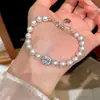 ¡Luz Fluyente de Luna! Pulsera de Cubo de Azúcar Circonita Perla Lujo Ligero Sensación de Alta Gama Estilo Nuevo Francés Moda Versátil Joyería para Mano