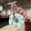 Alça de celular em tecido estilo doce e feminino com enfeites de strass, design criativo, atacado para chaveiros e pingentes de bolsa