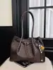 Bolso de hombro nuevo para mujer con un toque vintage de alta gama, bolso de mano casual, bolso tejido versátil para hombro y axila
