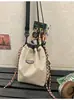 Bolso Cruzado de Marca de Moda Transfronteriza para Hombres y Mujeres, Deportes al Aire Libre, Mochila Pequeña de Cubo con Cordón de Ajuste y Combinación de Colores Estilo Coreano de un Solo Hombro
