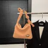 Bolsa de Pelúcia Estilo Preguiçoso de Comércio Exterior para Mulheres 2025 Nova Bolsa de Ombro Versátil Casual Bolsa Transversal Tote Estilo Western de Nicho