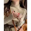 Suéter de punto de cachemira sintética para mujer, nueva colección de otoño 2026, cuello alto medio, manga larga, diseño calado, perfecto como capa interior o base para el invierno