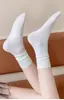 Calcetines holgados sin costuras en la puntera para mujer - Calcetines largos de punto medio de color sólido para primavera/otoño, 7A Antibacterianos, Resistentes al olor y Transpirables