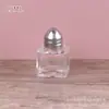 Botella de condimento directa de fábrica Frasco de condimento para el hogar Frasco de sal de vidrio Botella de condimento sellada Botella para pimienta material de barbacoa