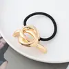 Estilo punk europeo y americano metal personalidad alta calidad cuerda para la cabeza semicírculo tubo redondo anillo para el pelo cuerda elástica para el pelo Balot fabricantes al por mayor