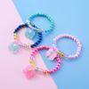 Pulseira Infantil Bonito Cor Bow Imitação Pearl Doll Pendurado Resina Pingente Pulseira Infantil Atacado