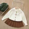 Nuevo Conjunto de Punto para Niña con Pompones y Lazos, Suéter Cardigan Estilo Suave para Bebé y Conjunto de Dos Piezas con Falda Plisada