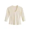 Ins moda feminina atacado estilo europeu e americano cruzado garota popular petite gola V ombro direito retalhos manga curta média slim fit camiseta