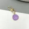 Llavero de aleación de zinc con cara sonriente de estilo europeo nuevo transfronterizo, accesorio versátil, pequeño regalo, colgante para bolso, accesorio de llavero