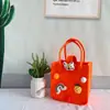Bolsa de fieltro portátil plato de dulces bolsa de fieltro de dibujos animados plato de frutas diseño de sala de estar bolsa de decoración para inauguración de casa al por mayor