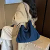 2026 Bolso de Lona Lavada Nuevo para Mujer con Correa de Hombro Rayada Gran Capacidad Bolso de Hombro Único Bolso Casual Coreano para Viaje de Trabajo Mujer