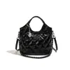 Bolso de hombro versátil de moda transfronterizo con un toque de alta gama, adecuado para ir al trabajo, bolso tipo cubo vintage, bolso de mano acolchado simple casual
