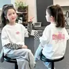 Camiseta de manga larga a rayas para niños, colección de primavera y otoño para niñas, nuevo estilo 2026, capa base de otoño de algodón puro, top de otoño para niñas