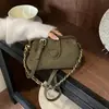 Bolsa transfronteiriça feminina japonesa coreana mini pequena bolsa de clipe feminina 2026 novo estilo moda médica ombro único bolsa de celular tb