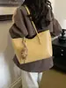 Bolso Tote Vintage para Mujer 2026 Nuevo Modelo Nicho Versátil Moderno Gran Capacidad Bolso de Hombro Bolso de Mano Simple para Viajes