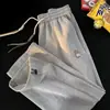 Calça de moletom waffle da moda transfronteiriça para homens, calça esportiva reta para primavera e outono da alta rua americana com toque fluido, calça casual masculina