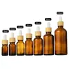 En stock frasco de esencia de vidrio marrón 5ml-100ml frasco gotero de vidrio frasco vacío de esencia marrón oscuro