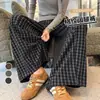 Toma real de los nuevos pantalones de pierna ancha a cuadros de gamuza para otoño e invierno 2026, pantalones casuales para mujer, pantalones largos elegantes y versátiles