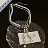 Collar de borla con estrella brillante de río y lazo Tide, cadena de cuello apilada de perlas multicapa, simple, temperamento, para mujer, venta al por mayor