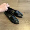 Mocasines slip-on Camellia de cuero suave para mujer, nueva colección otoño 2026, zapatos pequeños de cuero retro estilo británico, planos versátiles