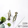Accesorios para joyería de aleación DIY 48*12mm pez curvo hueco doble agujero accesorios para pulsera espinas de pez