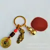 Suministro directo de fábrica cinco monedas de emperador latón calabaza cinnabar llavero colgante latón calabaza pequeña recogedor tiembla puesto callejero