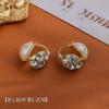 Pendientes explosivos retro de doble cara con perla y diamantes, de alta gama, con hebilla de oreja de diseño nicho.