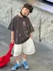 Tienda de Algodón Ropa de Verano para Niños Camiseta Versátil de Manga Corta para Niños 2026 Nuevo Estilo Coreano Resistente de Moda Lavada Moda Infantil