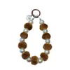 Cadena para teléfono de bola de felpa con perlas y cuentas para otoño e invierno, colgante de bolsa de bola de felpa lindo, llavero para teléfono de niña