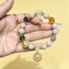 Artículo popular en transmisión en vivo de nuevo producto: Pulsera de porcelana y vidrio con ceniza de incienso de Pekín, pulsera de mano de porcelana con ceniza de incienso del pequeño libro rojo para hombres y mujeres