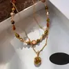Accesorios de Collar de Cuentas de Ojo de Tigre Natural para Mujeres Cadena para Suéter de Capas Cadena de Lujo Ligero Nicho Sensación de Gama Alta Colgante Collar Gargantilla Adornos