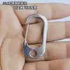 Suministro transfronterizo nuevo llavero de acero inoxidable hebilla de cinturón para hombre mochila exterior hebilla de resorte simple resistente a la tensión