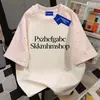 2026 Verano Casual Americano Ins Camiseta de Manga Corta para Pareja Mujeres Estrellas Algodón Puro Patchwork Diseño de Letras Top para Hombres