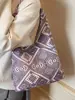 Bolsa Étnica de Alto Padrão com Textura Premium, Nova Moda Outono e Inverno 2025 Bolsa Tote para Mulheres, Versátil de Ombro e de Mão de Nicho
