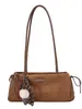 Bolso de axila de nicho estilo francés para mujer, nueva colección otoño/invierno 2026, bolso de hombro casual retro, bolso baguette de alta gama para el trabajo