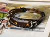 Pulsera étnica de piel de vaca pulsera de cuero vintage al por mayor pulsera punk nueva pulsera europea y americana joyería tejida