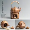 Cerámica Leña Vigas Elevadoras Hogar Cerámica Gruesa Tetera Retro Japonés Estufa Cálida para Té Cuerda Anti-Quemaduras Juego de Té Kung Fu