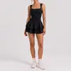 Falda corta de tenis sin espalda estilo europeo y americano, tacto nude, ajustada, anti-exposición para mujer, nueva falda corta transfronteriza para correr al aire libre, fitness, yoga