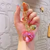 Accesorios pequeños de bricolaje transfronterizos, colgante de llavero de manzana galvanizado, colgante exquisito para mujer, llavero colgante pequeño al por mayor
