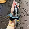 Llavero Creativo de Perro Salchicha de Cuero Lindo Dibujo Animado Cachorro Colgante para Bolso de Cuero Llavero de Lujo Accesible Pequeño Regalo