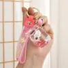 Nuevo portaceite fresa conejo adorable botella de arena movediza llavero más vendido botella a la deriva accesorios acrílicos adornos para mochila de estudiante
