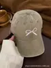Gorra de béisbol con lazo para mujer, nueva moda primavera/verano, gorra de visera versátil bordada, sombrero de protección solar para hombre, casual y versátil